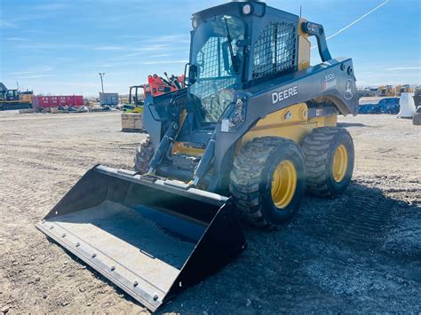 john deere 332 skid steer attachments|john deere skid steer price.